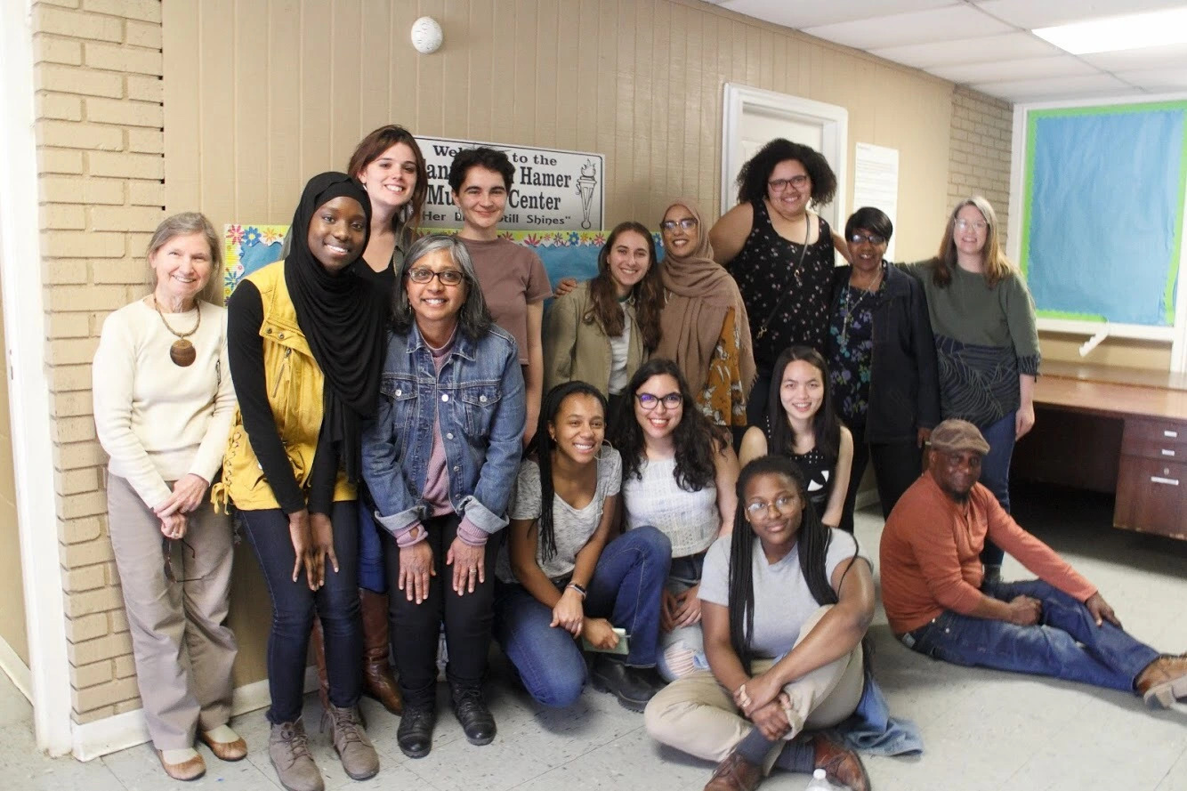 Photo of me and students in Mississippi with community members